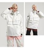 Two front-view poses of a model wearing the white Range pullover snow jacket with different snow pants.