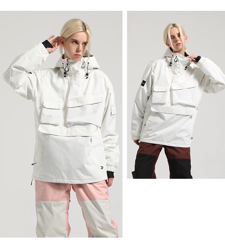 Two front-view poses of a model wearing the white Range pullover snow jacket with different snow pants.