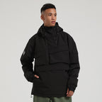Model wearing the black Range pullover snow jacket, showing its high collar and large front pockets.