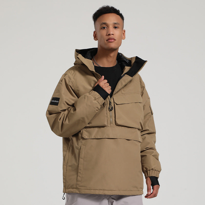 Model wearing the khaki Range pullover snow jacket with the half-zip front open and inner cuffs visible.